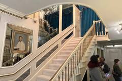 Staircase leading up to the private bedrooms