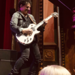 Neal Schon jamming on his guitar