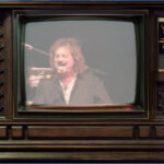 Old television with music show on the screen