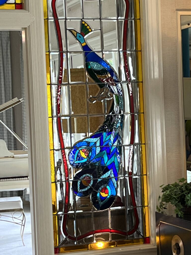 Stained glass peacock in Graceland