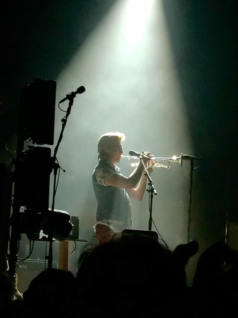 Mike McDuck Olson Plays the trumpet